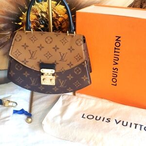 ORIGINAL MICROCHIPPED REVERSIBLE LV TISLITT WITH ENTRUPY.